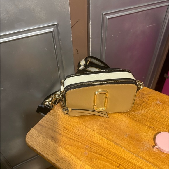 Marc Jacobs Handbags - Marc Jacobs Stylish Cream and Black Crossbody Bag